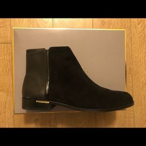 Black leather and suede boot